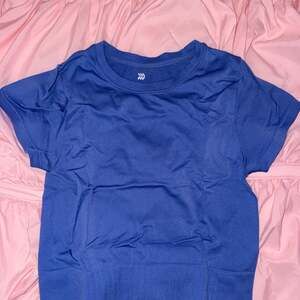 all in motion blue cropped workout tee